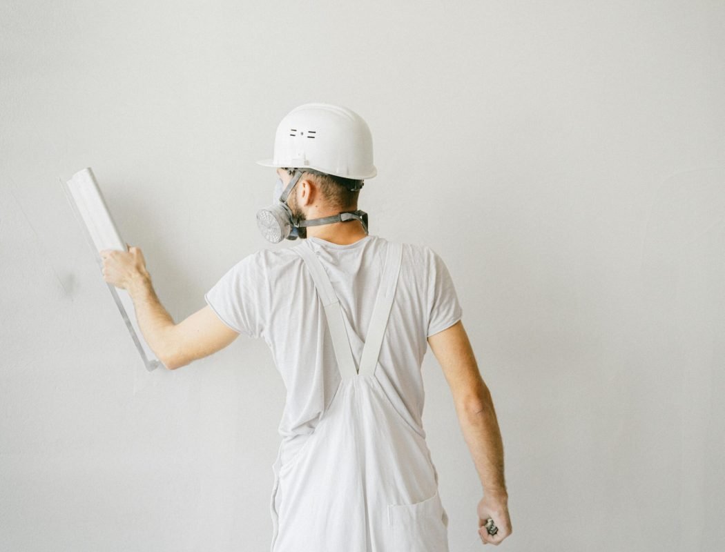 pexels-photo-5493658-5493658 A Construction Worker Working on the Wall of a House